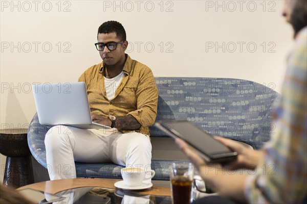 Young man in coffee shop