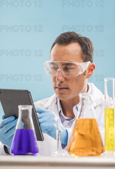 Scientist using digital tablet