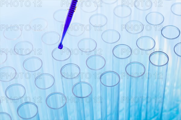 Blue liquid in pipette and test tubes