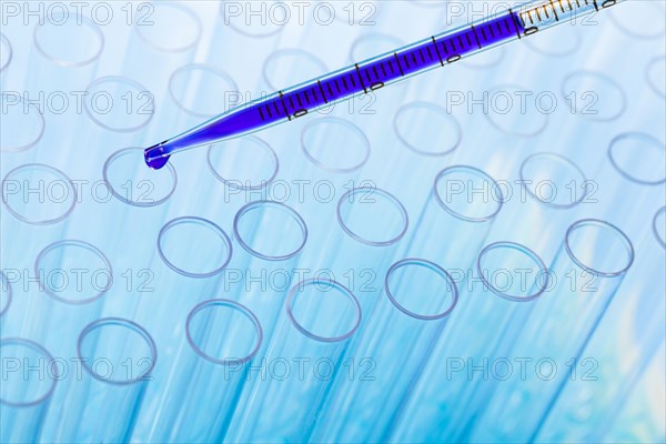 Blue liquid in pipette and test tubes