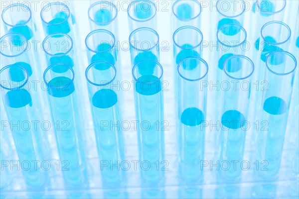 Close-up of test tubes with blue liquid