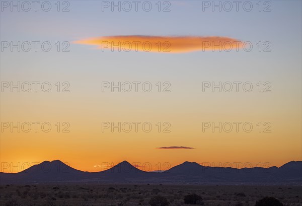 Lenticular cloud over Cerrillos Hills State Park at sunset