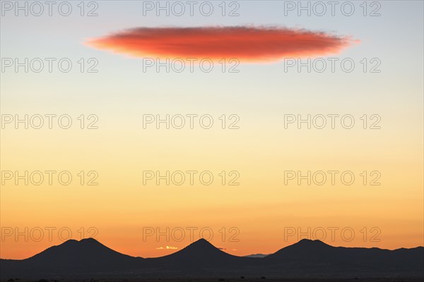 Lenticular cloud over Cerrillos Hills State Park at sunset