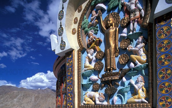 Buddha bas relief on stupa in Buddhist Lamayuru Monastery