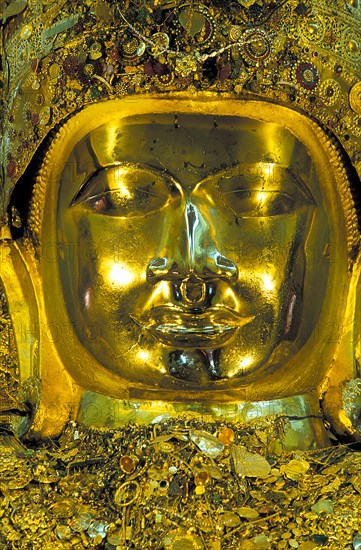 Giant golden buddha statue in Buddhist temple