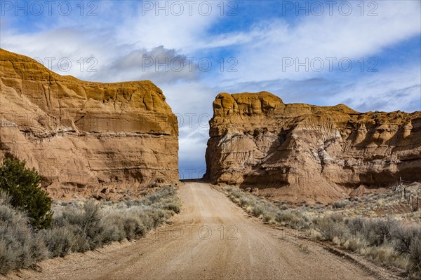 Dirt road between sandstone cliffs in Grand Staircase-Escalante National Monument