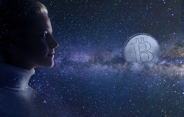 Profile of woman with bitcoin on night sky