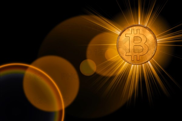 Golden glowing bitcoin