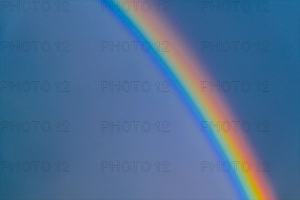 Rainbow on blue sky