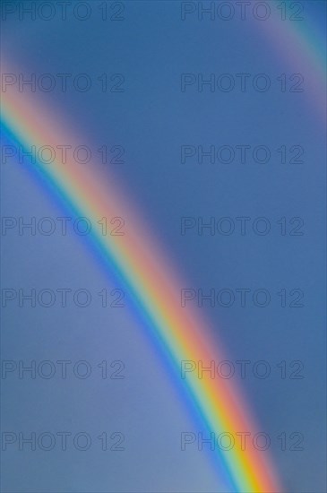 Rainbow on blue sky