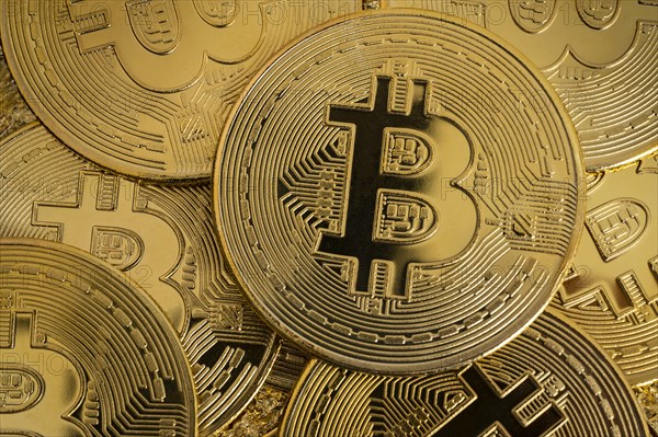 Close-up of golden bitcoins