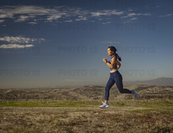 Woman jogging in landscape