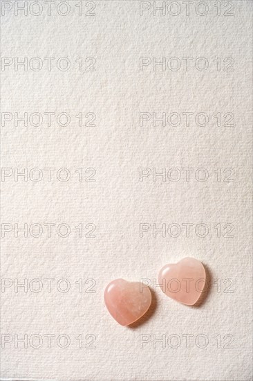 Glass hearts on white background