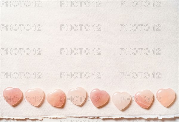 Glass hearts on white background