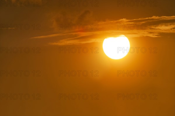 Setting sun and clouds