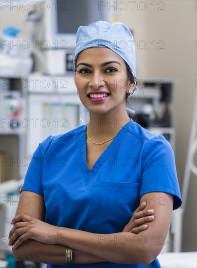 Portrait of female doctor wearing scrubs