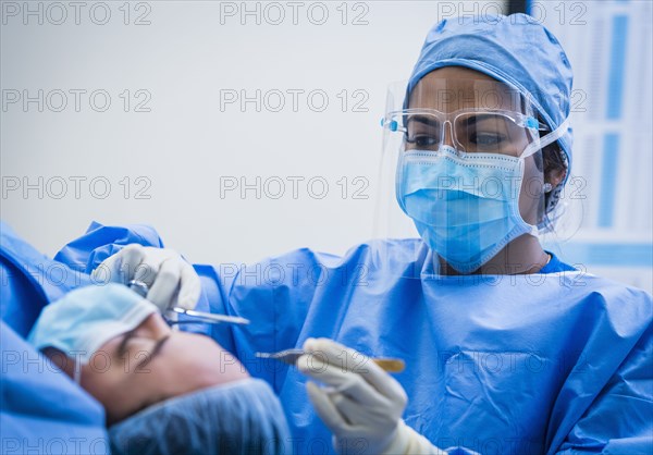 Doctor and patient during surgery
