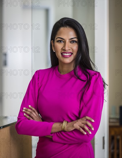 Portrait of beautiful woman at reception desk