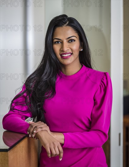 Portrait of beautiful woman at reception desk