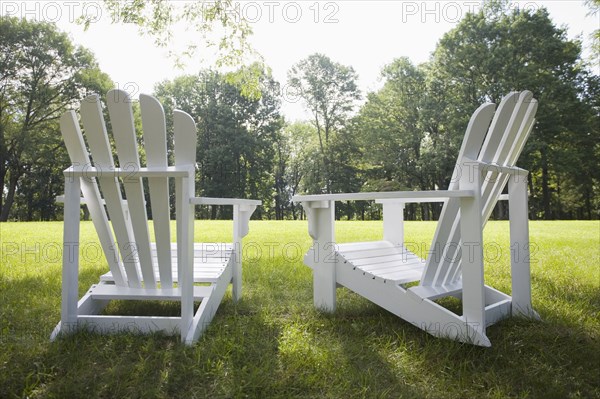 Adirondack chairs in backyard