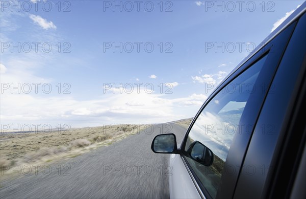 Usa, Wyoming, Rural road seen from car