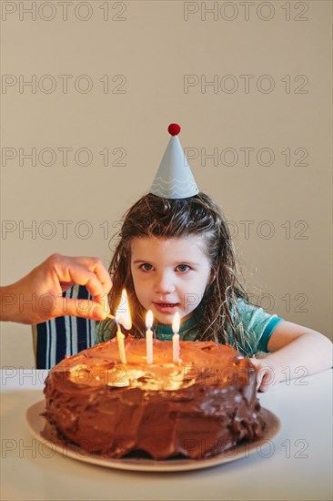 Girl celebrating her third birthday
