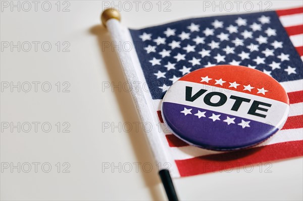 Vote pin on American Flag