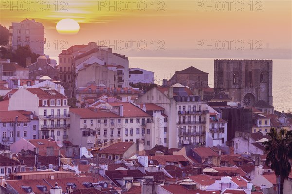 Portugal, Lisbon, Town buildings at sunrise