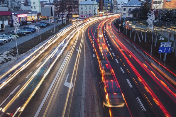 Poland, Subcarpathia, Rzeszow, Evening traffic in city