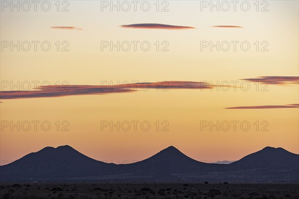 Usa, New Mexico, Santa Fe, El Dorado, Sunset sky over landscape with hills