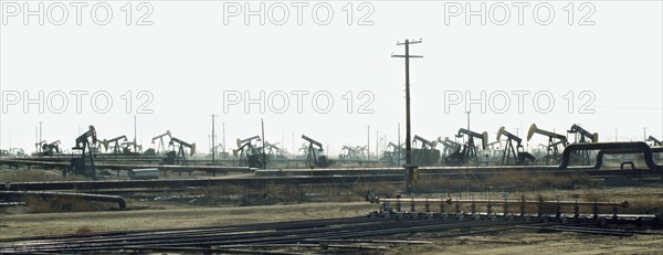 Pump jacks in oil field