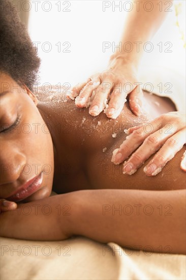 Close-up of woman receiving spa treatment