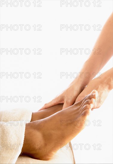 Close-up of woman receiving foot massage
