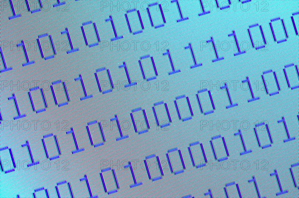 Close-up of pixelated binary numbers on computer screen