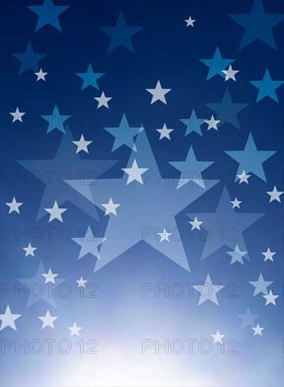 Pattern of stars against blue sky with sun burst