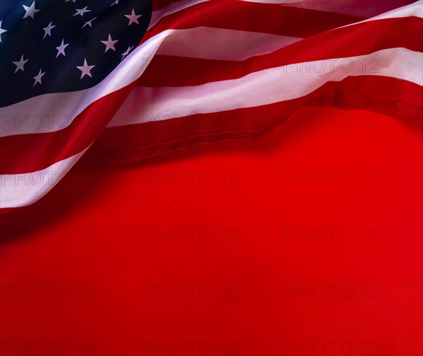 American flag against red background