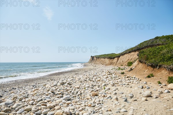 Bluff and rocky beach with ocean waves