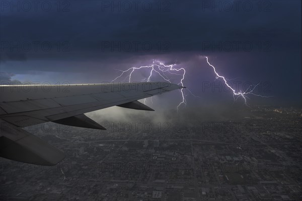 Thunderstorm and lightning seen from airplane