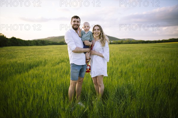 Portrait of parents with baby son