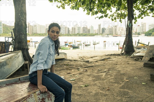 Woman sitting on upside