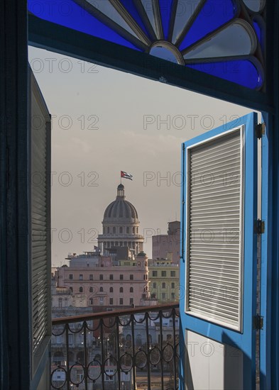 Balcony doors over cityscape