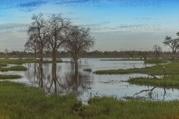 Clouds over pond in remote landscape