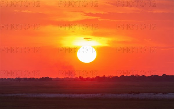 Glowing sunset over remote landscape