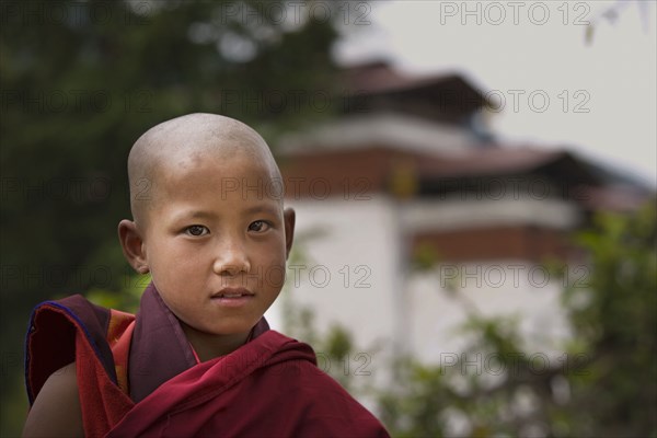 Asian boy wearing traditional robe