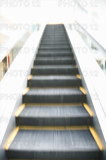 Blurred view of escalator steps