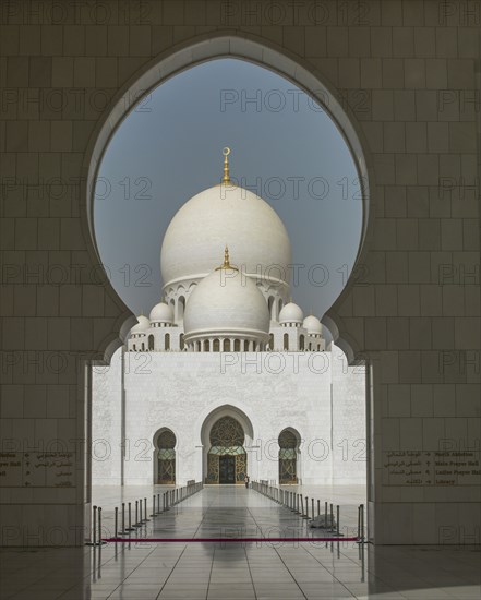 Ornate domed building and keyhole archway