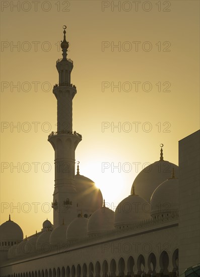 Silhouette of ornate domed building and spires