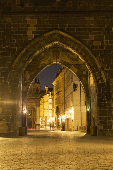 Arches in stone wall outside city