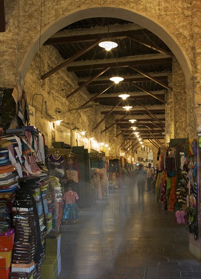 Blurred view of people shopping in indoor market