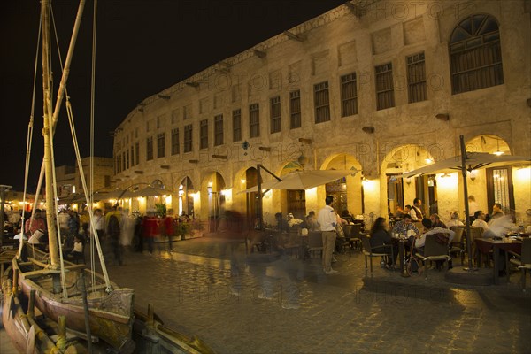 Blurred view of people shopping in outdoor market